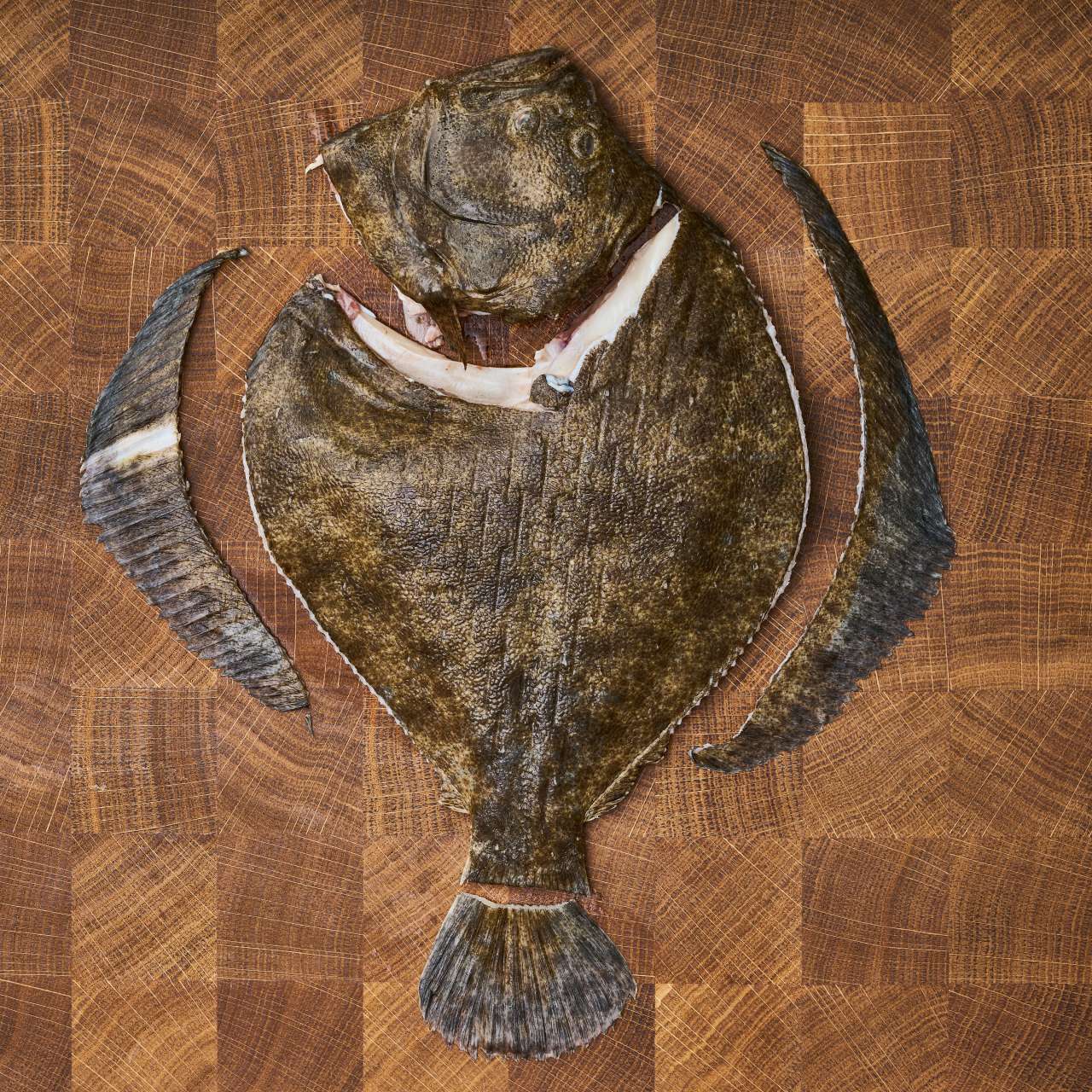 Rezept: Steinbutt mit Calvadosbutter, Wirsing und Äpfeln