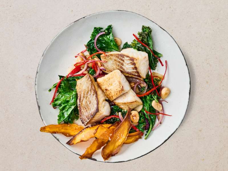 Seelachswürfel mit viel frischem Grünkohl