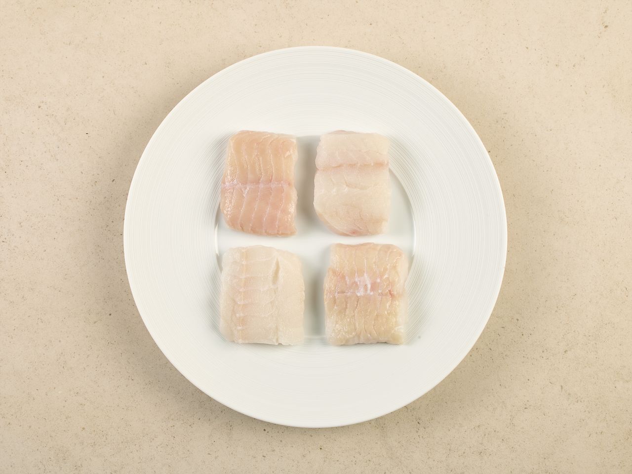 Steinbeißer · Handfiletierte Portionen · TK Steinbeißer · Handfiletierte Portionen · TK