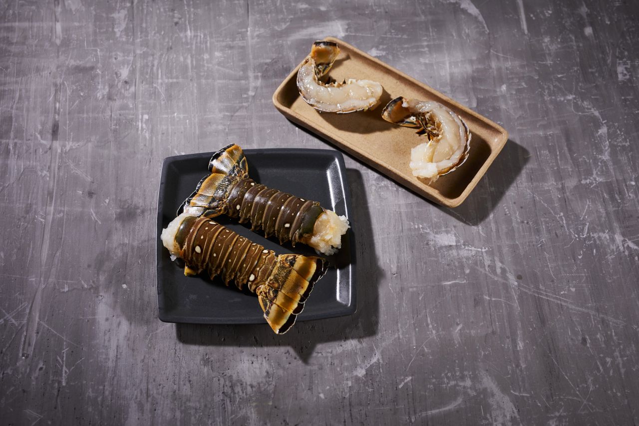 Wie breche ich Langustenschwänze aus?