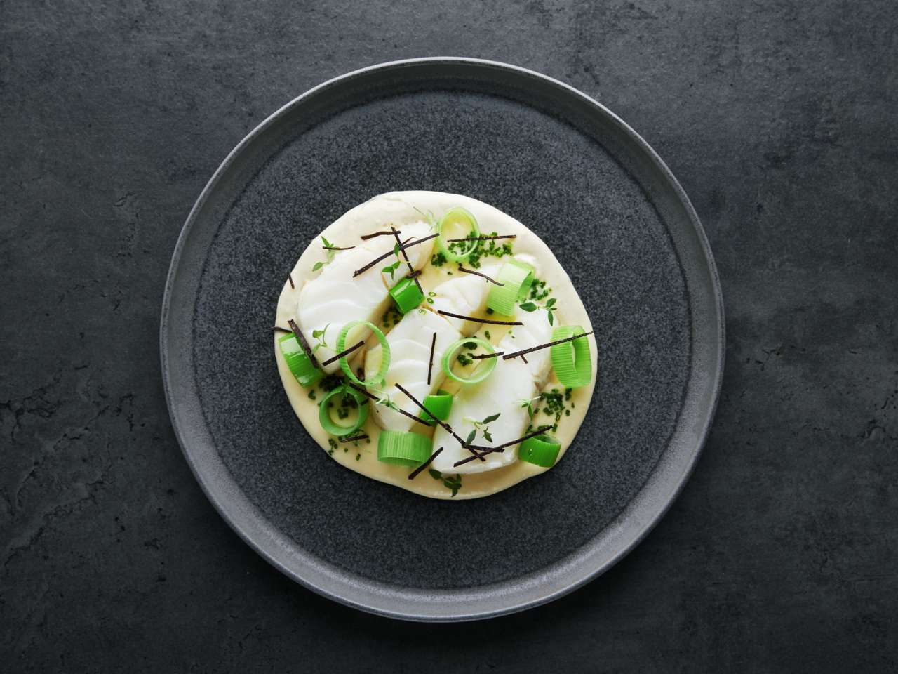 Rezept: Skrei mit Kartoffeln, Lauch und Trüffel Rezept: Skrei mit Kartoffeln, Lauch und Trüffel