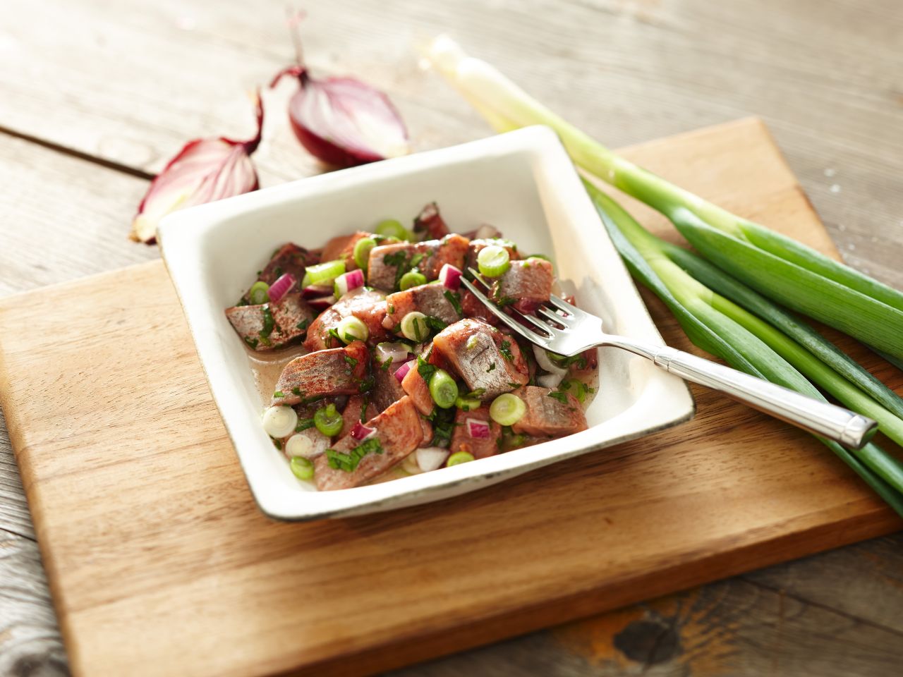 Matjeshappen in Kräutervinaigrette