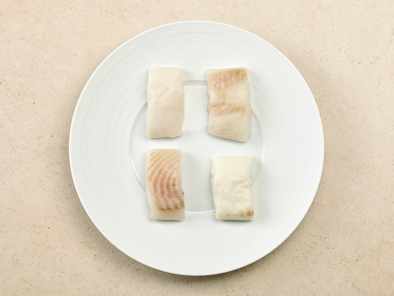Weißer Heilbutt · Handfiletierte Portionen · TK Weißer Heilbutt · Handfiletierte Portionen · TK