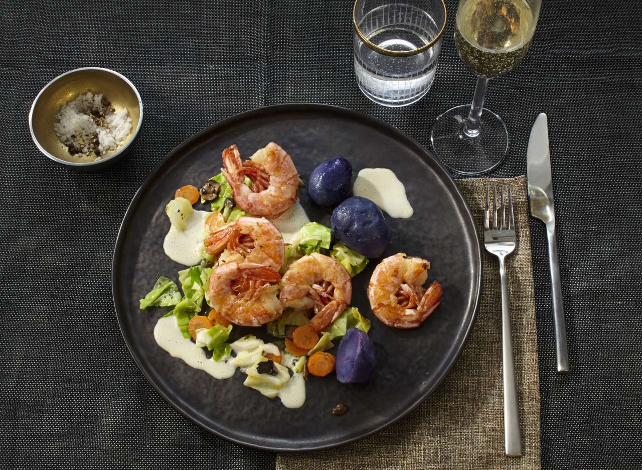 Garnelen mit getrüffeltem Spitzkohl & Champagnersauce