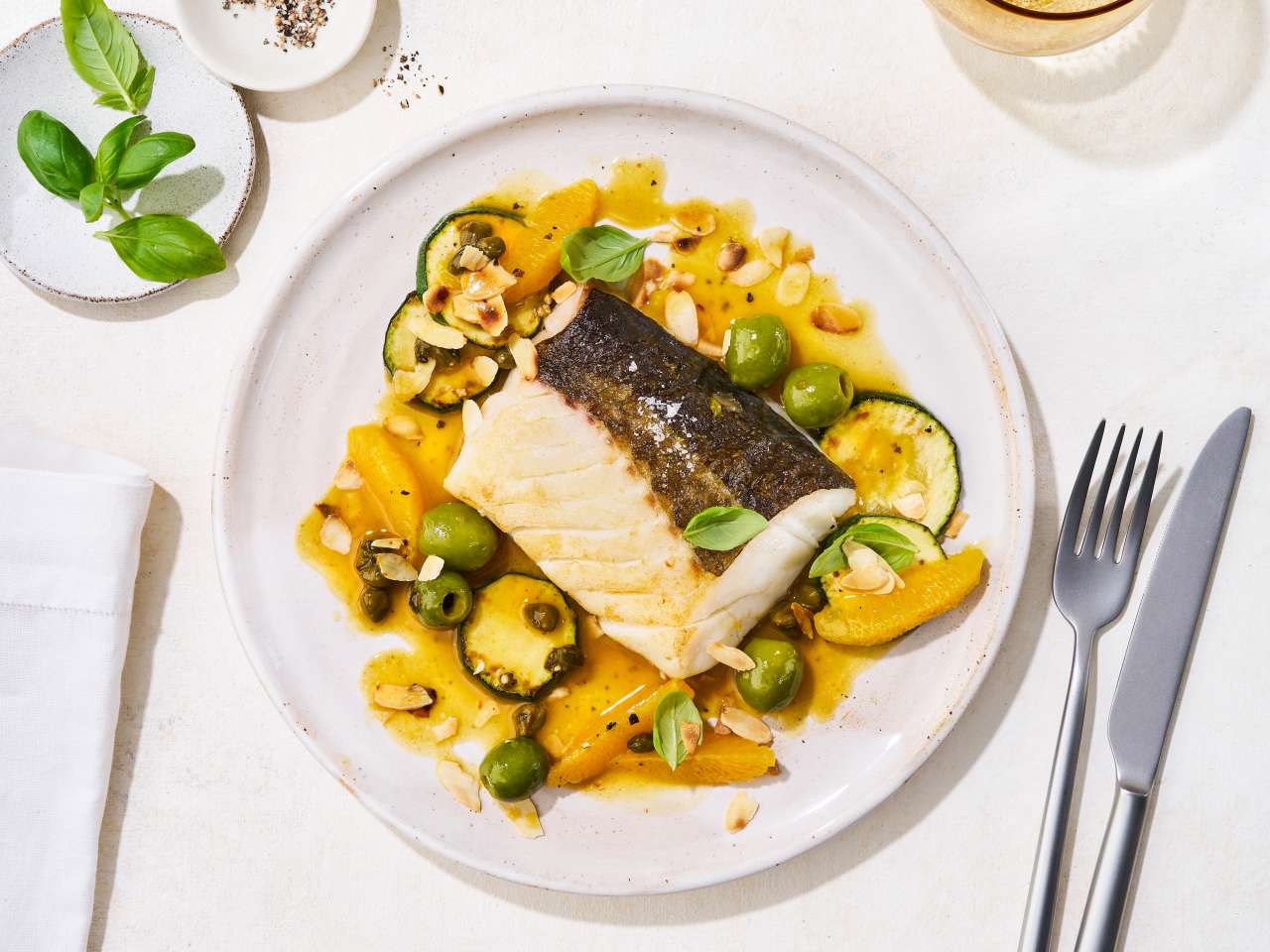 Kabeljaufilet in Mandel-Orangen-Butter