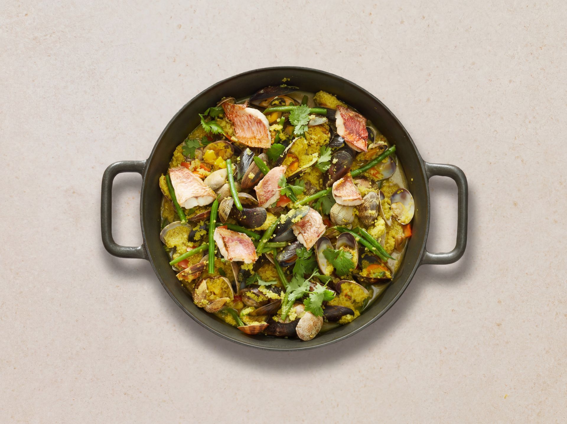 Afrikanische Paella mit Rote Meerbarbe
