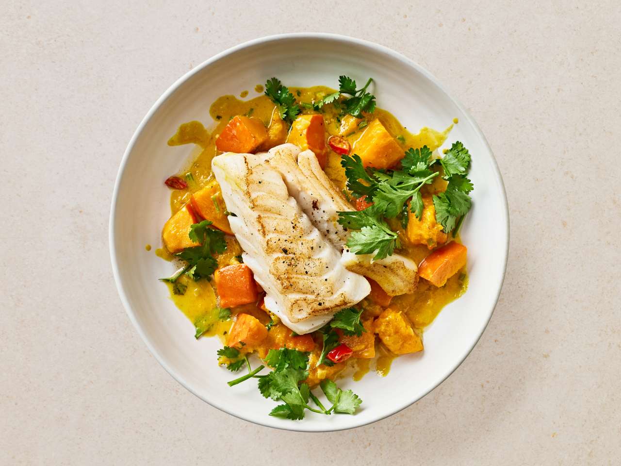 Kabeljaufilet mit Butterkürbis in Kokosmilch